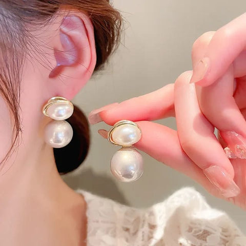 Eliptical Pearl Studs Earrings